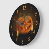 蝋燭が付いているハロウィンのカボチャランタン ラージ壁時計 (傾斜)