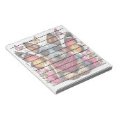 蝶と花に囲まれたヒエラーパピー ノートパッド (アングル)