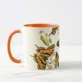 蝶カラフルと毛虫の集まり マグカップ (左)
