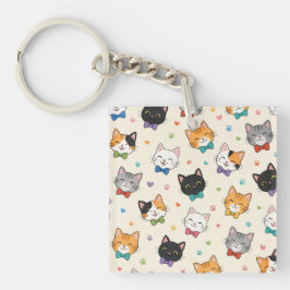 蝶ネクタイをした笑顔の猫 キーホルダー
