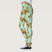 蝶パターン暗カラフル色 レギンス (左)