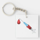 血の滴が付いた医療用注射器 キーホルダー (正面)