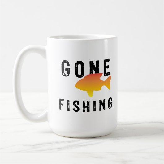 行き過ぎた魚釣り コーヒーマグカップ (左)