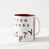 行為は心配を吸収します ツートーンマグカップ (正面右)
