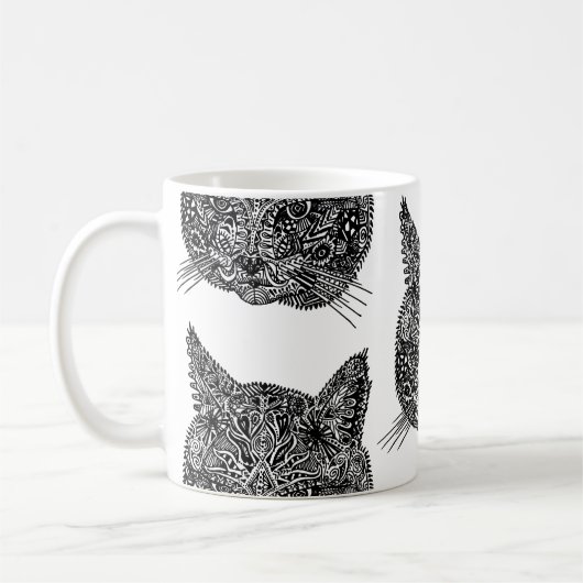 装飾的な猫の頭 コーヒーマグカップ (左)