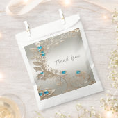 装飾金ゴールドブルーストーンフェイスバッグ フェイバーバッグ (クリップ留めされた状態)