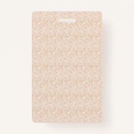 複雑なモチーフの茶色い敷物が床に置かれている バッジ