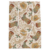 西クリスマスブーツと帽子のパターン ミディアムペーパーバッグ (裏面)