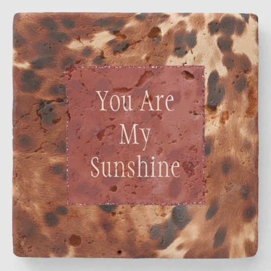 西クリームスポッテッドブラウンブラックコウィド ストーンコースター (正面)