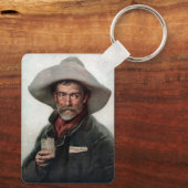 西部開拓時代の酒場にいるスペイン風のランチェロカウボーイ キーホルダー (裏面)