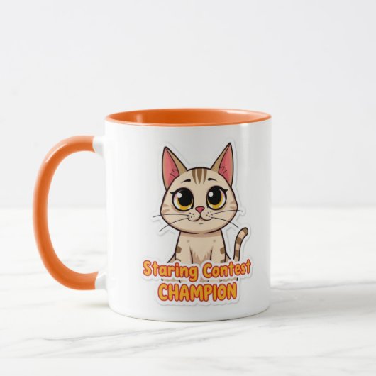 見つめコンペのチャンピオン マグカップ (左)