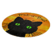 覗き見る黒猫オレンジトリック・オアトリート カッティングボード (角)