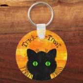 覗き見る黒猫オレンジトリック・オアトリート キーホルダー (正面)