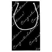 親指にステッカーを貼る スモールペーパーバッグ (裏面)