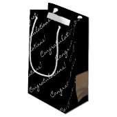 親指にステッカーを貼る スモールペーパーバッグ (裏面アングル)