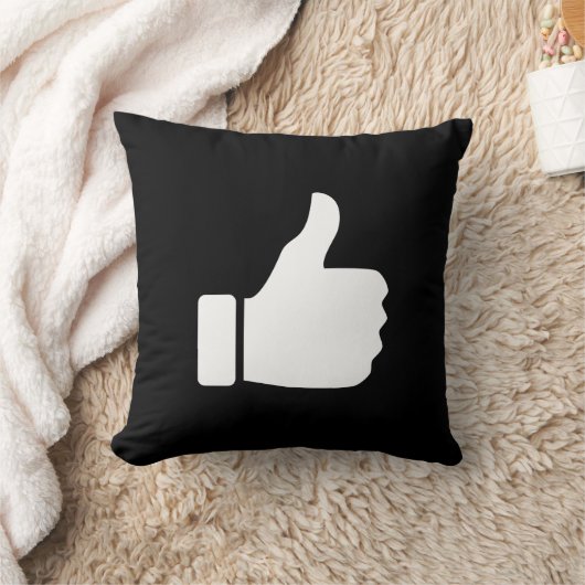 親指はピクトグラムの装飾用クッションを持ち上げます クッション (ブランケット)