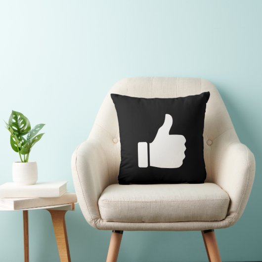 親指はピクトグラムの装飾用クッションを持ち上げます クッション (椅子)