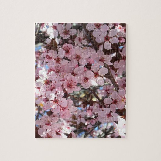 観賞用の花の木の上のピンクの花 ジグソーパズル (縦)