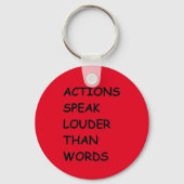 言葉よりも話大きい行動TRUTH COMMENTS MOT キーホルダー (正面)