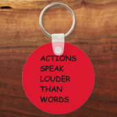 言葉よりも話大きい行動TRUTH COMMENTS MOT キーホルダー (正面)