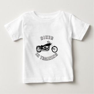 訓練バイクもしくは自転車に乗る人 ベビーTシャツ