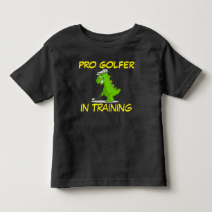 訓練中の可愛い恐竜プロゴルファー トドラーTシャツ