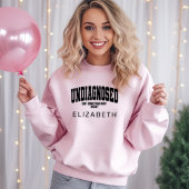 診断されていないが、何か右の白と黒 スウェットシャツ