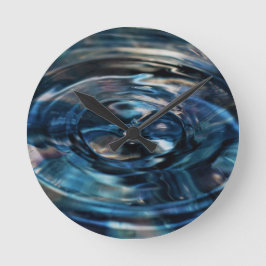 詩人Adiela Akooによる水時計 ラウンド壁時計