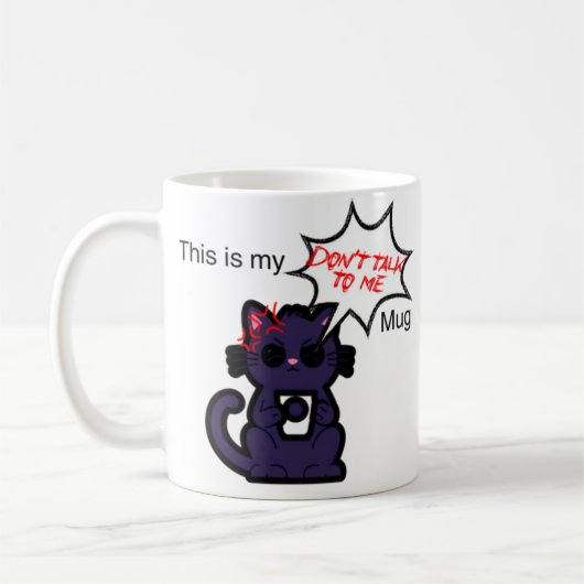 「『話さないでくれ』のマグカップ猫版 コーヒーマグカップ (左)