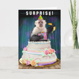 誕生日のおもしろいサルがケーキバナナから飛び出す シーズンカード