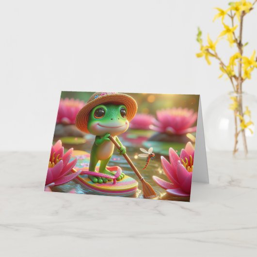誕生日のカエルが池のフロップに浮かぶ カード (黄色い花)