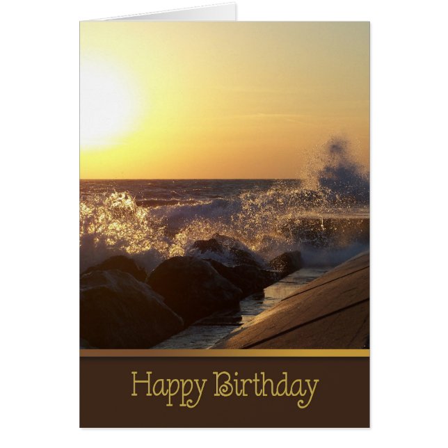誕生日の夕日がビーチの岩に (正面)