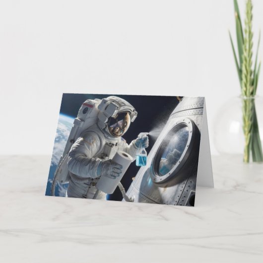 誕生日の宇宙飛行士が宇宙船の窓を掃除 カード (正面)