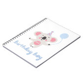 誕生日の男の子テディベア風船を持って ノートブック (左側)