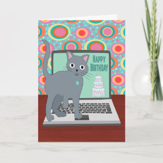 誕生日を迎えた猫がノートパソコンでタイピング カード