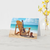 誕生日カウボーイブーツとギターをオンビーチ カード (黄色い花)