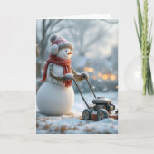 誕生日雪だるまが芝刈りを押す カード (正面)