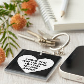 誰にも言わない戦争に勝てば幸いだ キーホルダー (正面右)