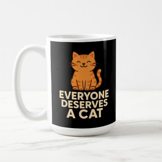 誰もが猫を愛するに値する かわいいオレンジテブby猫ラブ コーヒーマグカップ (左)