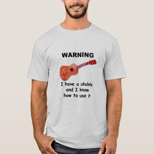 警告: 私にウクレレがあり、それを使用する方法を知っています Tシャツ (正面)