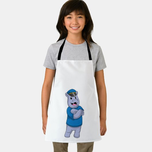 警察帽を被った警察官としてのカバ エプロン (インサイチュ)