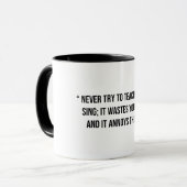 豚に歌い教えを聞こうとしない マグカップ (正面左)