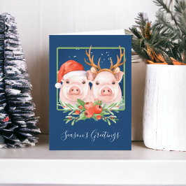 豚サンタとトナカイのカップルのクリスマス シーズンカード