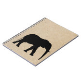 象のインクによって押されるジャーナル ノートブック (左側)