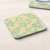 貝が付いている背景。 手描き コースター (左側)