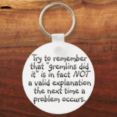 責任:次回のエラー発生時 キーホルダー (正面)