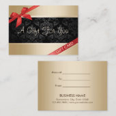 贅沢な金ゴールドの背景の赤いリボンのギフト券 割引カード (正面/裏面)