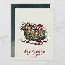 贈り物と緑のあるヴィンテージクリスマスそり