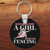 贈り物を愛する少女を決して過小評価しない キーホルダー (正面)