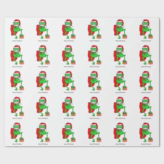 赤いおもしろいサンタクロースの帽子をかぶったカエル ラッピングペーパー (フラット)